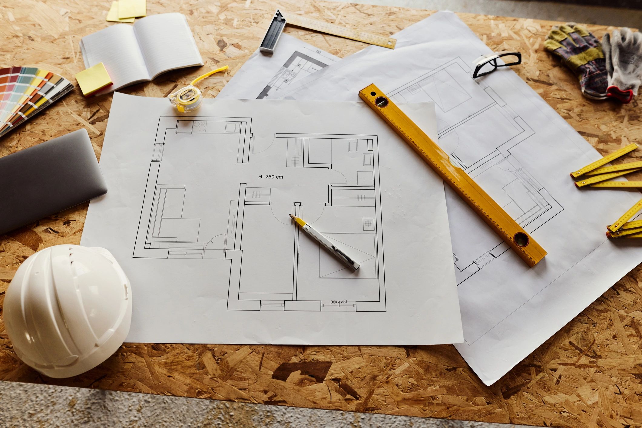 Construction tools and plans representing code review.