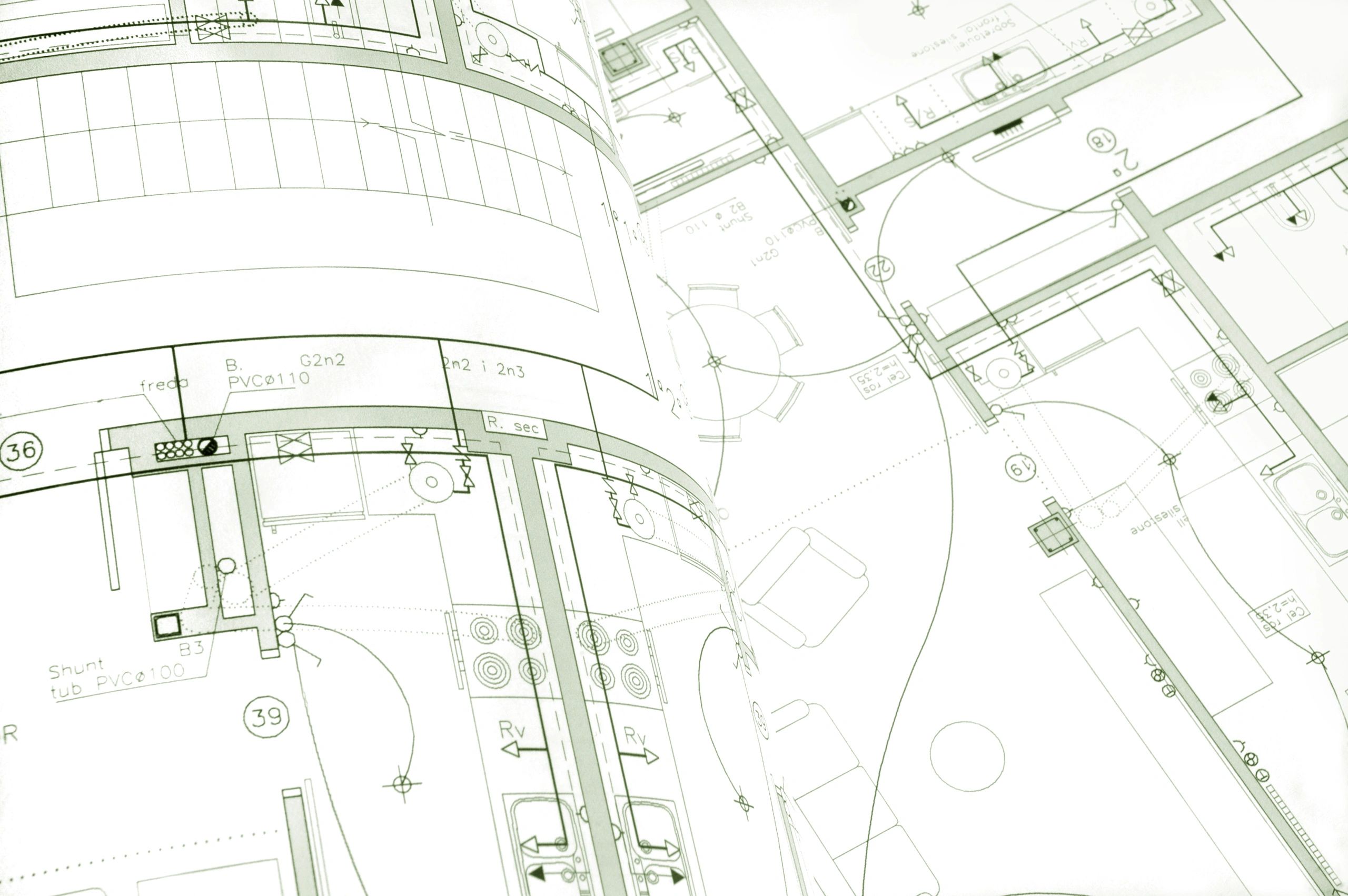 Residential blueprint drawing set on a table
