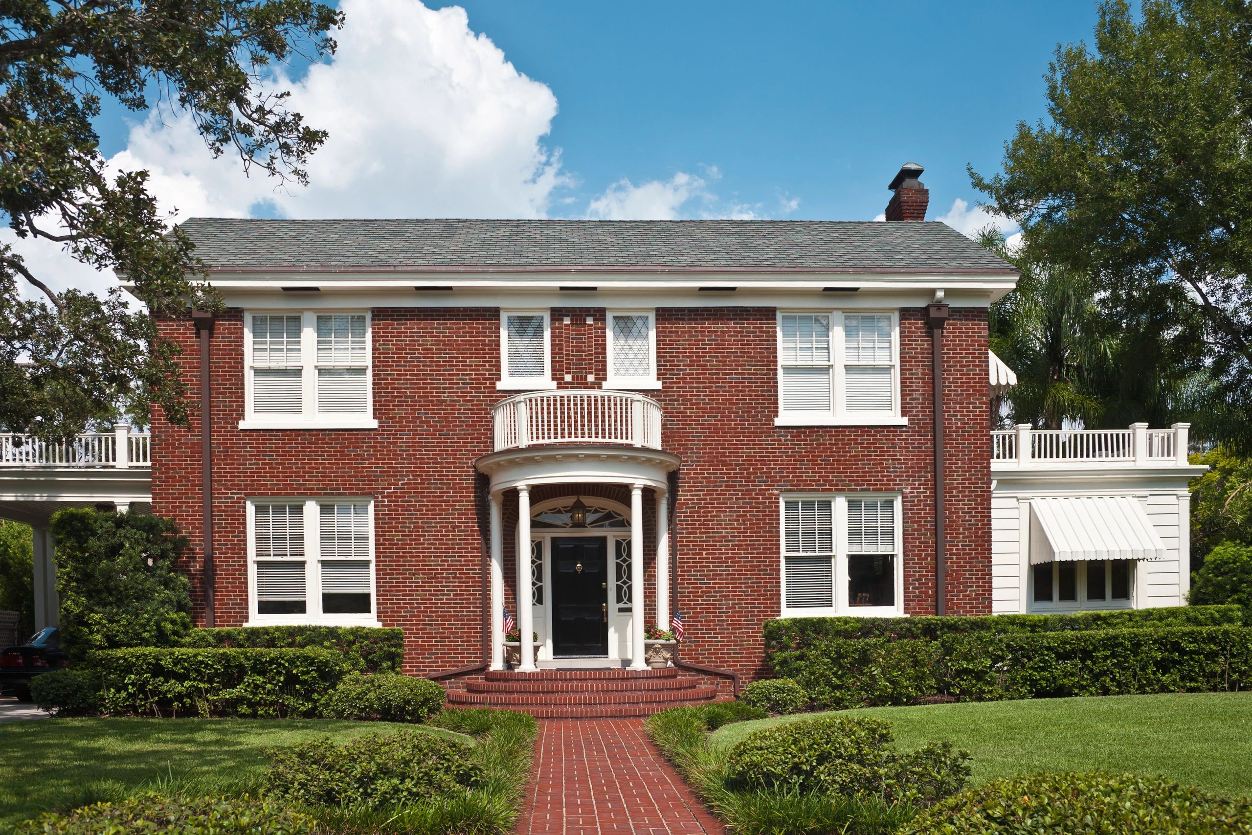 Traditional brick colonial home exterior