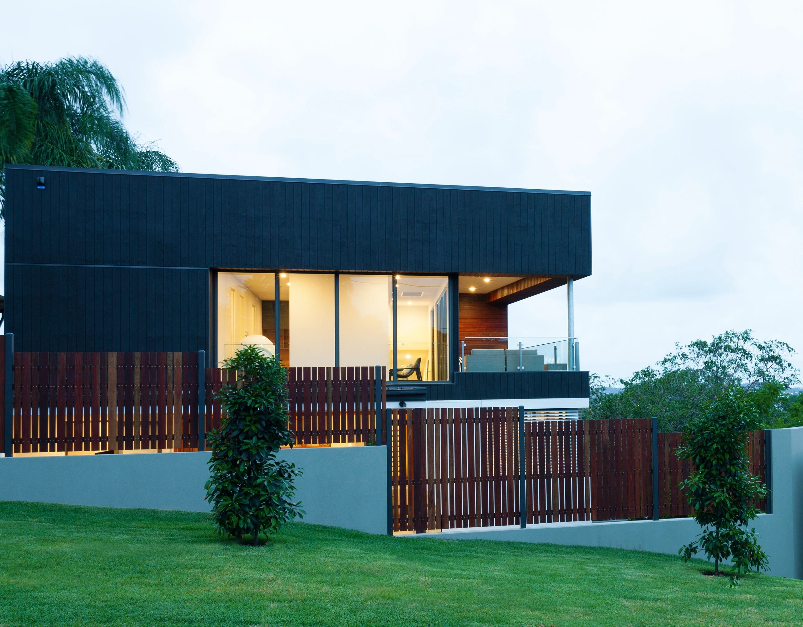 New modern home exterior at dusk